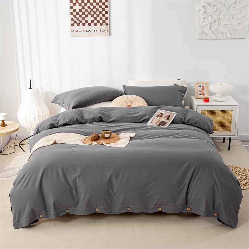 Chambre parure lit gris crissant sur lit lampe