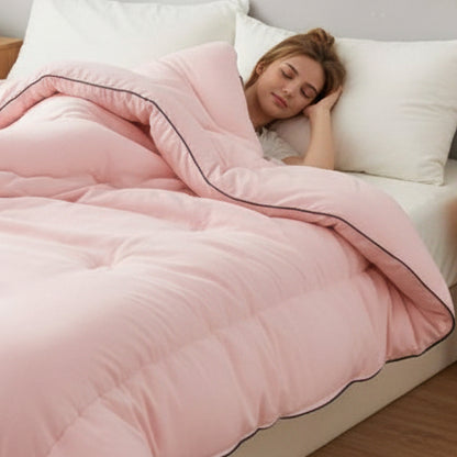 Couette 1 personne rose femme couchée sereine