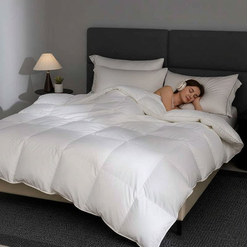 Couette 260x240 pur oie lit femme casque d'écoute couchée
