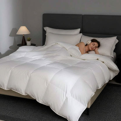 Couette 260x240 pur oie lit femme casque d'écoute couchée