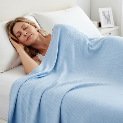Couverture rafraîchissante bambounfemme couchée apaisée