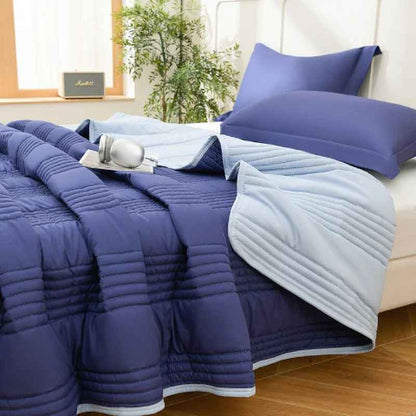 Couvre lit matelassé deux tons bleus réversible vue côté