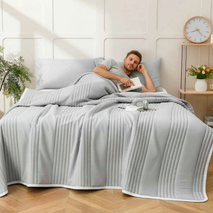 Couvre lit matelassé gris réversible homme couché livre