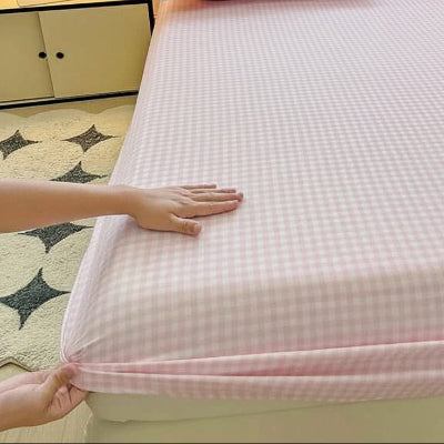 Drap-housse 90x190 carreaux rose mains fixe coin