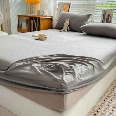 Drap-housse 90 x 190 gris coin relevé
