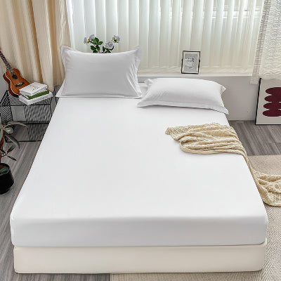 Drap housse blanc luxe épuré lit vue face