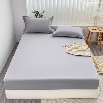 Drap housse gris élégant lit vue de face