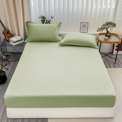 Drap housse vert élégant lit vue de face
