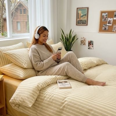 Housse de couette 220x240 fille assise sur lit