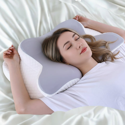 Oreiller ergonomique cervicale femme couchee sur dos