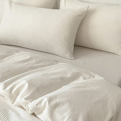 Parure de lit 220 x 240 coton gaufré blanc oreillers