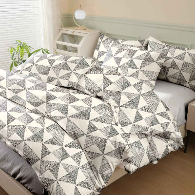 Parure de lit 240 x 260 motif géométrique housse repliée