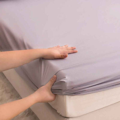Protège matelas gris clair main fixe coin