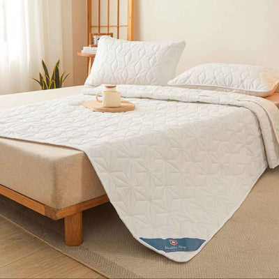 Protège matelas imperméable blanc déposé angle