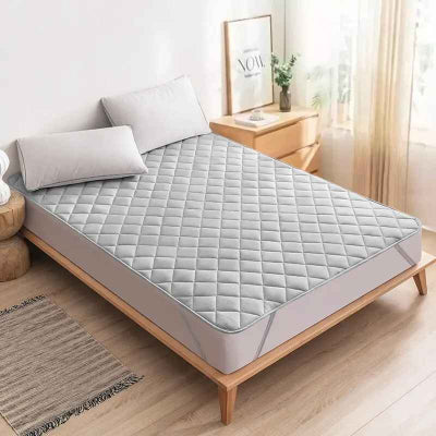 Protège matelas imperméable gris chambre lumière du jour