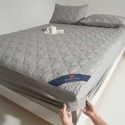 Protège matelas imperméable gris mains fixes coin