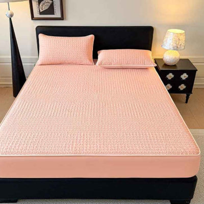 Protège matelas imperméable rose vue chambre complète